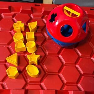 Tupperware Shape Sorting Ball Toy - Red and Yellow